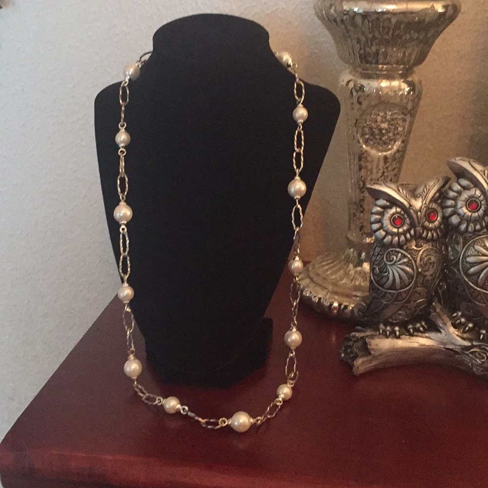 White pearl necklace.